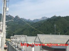 密云不老屯长寿之乡，四处环山，环境优美，可看远处长城门楼